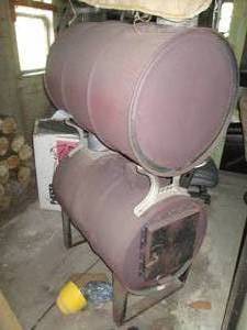 lot 79 image: Double Decker wood burning stove