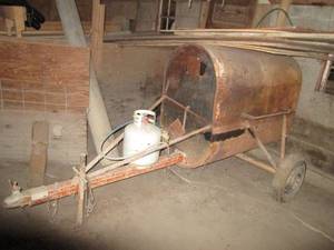 lot 388 image: Home made propane fired grill on wheels