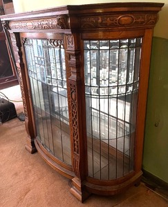 lot 17 image: Gorgeous Multi Glass Panel Display Cabinet with Carved Figurines