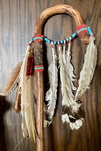 lot 404 image: Vintage Cane with Feather Accents and a Wooden Walking Stick