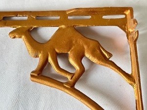 lot 186 image: Four Decorative Metal Camel Figurine Shelf Brackets