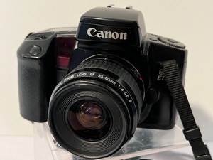 lot 238 image: Canon EOS Elan Film Camera, Canon 75-300 mm Lens and Solignor 20mm Lens