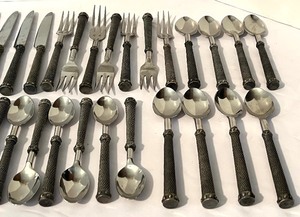 lot 239 image: Unique Flatware Set