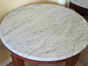 lot 78 image: Marble Topped Round Carved Wood Table