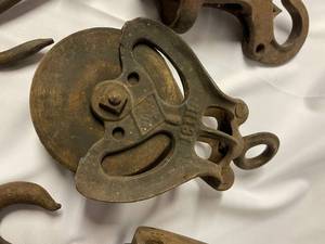 lot 347 image: Vintage Wood and Metal Pulleys