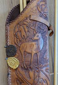 lot 208 image: Tooled Leather Quiver and Arrows
