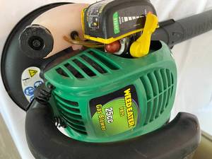 lot 365 image: WeedEater 25CCGas Powered Leaf Blower Model FB25