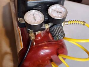 lot 327B image: Coleman Powermate Portable Air Compressor
