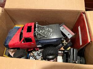 lot 50 image: Lot of Remote Control Cars in BoxBin
