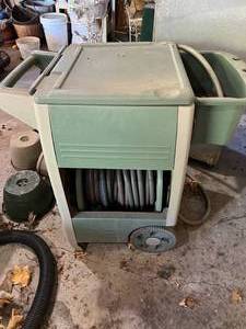 lot 76 image: Garden Hose Caddy