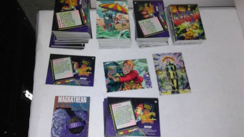 lot 187 image: Dont Panic The Hitchhikers Guide To The Galaxy Fantasy Art Trading Cards