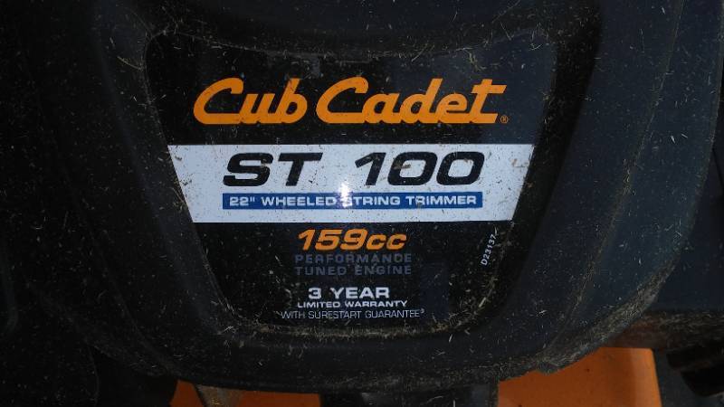 lot 600X image: Cub Cadet ST 100 12 In. Wheeled String Mower.