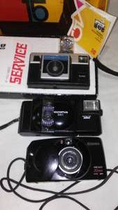 lot 271 image: 3 automatic cameras. Kodak X-15 in box. Olympus XA1, Canon sure shot 70 Zoom.