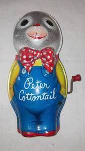 lot 295 image: Pressed Tin Toy Crank Peter Cotton Tail.