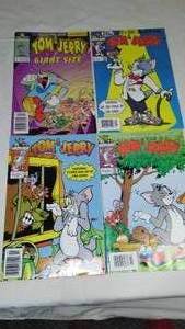 lot 324 image: Tom and Jerry comic books. 3 issues of no 1. And no. 2.
