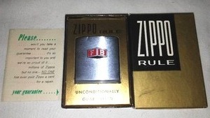 lot 384 image: Vintage Zippo Rule Tape Measure.