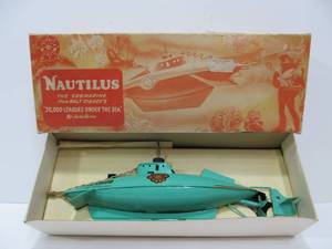 lot 167 image: MINT in Box Vintage 1950s era Walt Disney Productions Tin Litho NAUTILUS Clockwork Submarine Toy