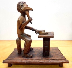 lot 314 image: Very Cool Larger Size Handmade Wood Carving of a Cobbler or Shoe Maker