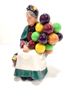 lot 327 image: Vintage ROYAL DOULTON Porcelain Figurine - The Old Balloon Seller