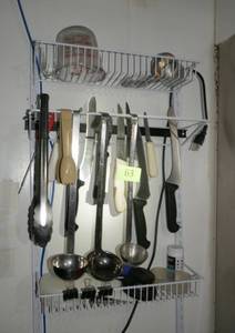 lot 63 image: Wall hanger with knives and utensils