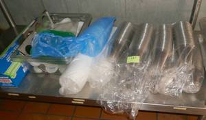 lot 117 image: Lot of plastic cups, covers, foil wrap