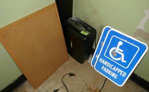 lot 132 image: Coin holders, 2 new handicapped parking signs, cork board and paper shredder, 2 drawer file cabinet, power strip etc