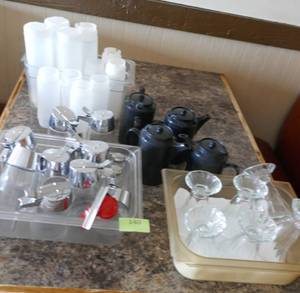 lot 140 image: 9 syrup dispensers, 6 sundae glasses, 4 tea pots, condiment bottles
