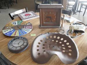 lot 150 image: Clocks, tractor seat and misc