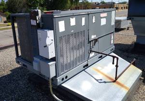 lot 95 image: Goodman 5 ton Rooftop heating AC unit