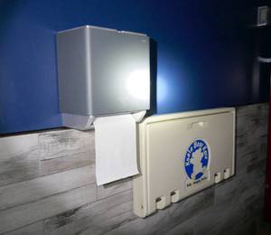 lot 160 image: Baby changing Stn and towel dispenser Mens bathroom