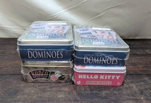 Four Sets Of Dominoes