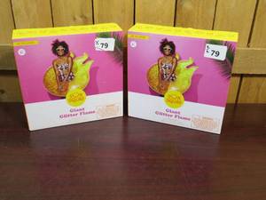 lot 79 image: Bundle of TWO Sun Squad Giant Glitter Flame Pool Floats