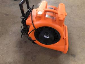 lot 7 image: RIDGID 1625 CFM 3-Speed Portable Blower Fan Air Mover with Collapsible Handle and Rear Wheels for Water Damage Restoration  Customer Returns See Pictures