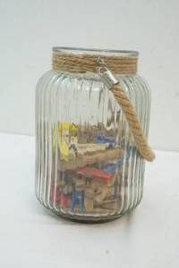 Glass jar with wood clothes pins