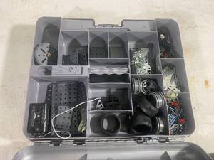 lot 67 image: Erector Set in original plastic storage container.
