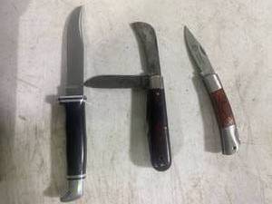 lot 84 image: 2 pocket knives and a knife with a belt sheath
