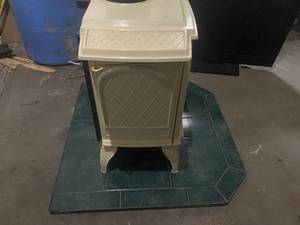 lot 15 image: Antique Electric Heater and Platform