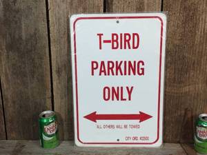 lot 7 image: Metal T-Bird Parking Only Sign