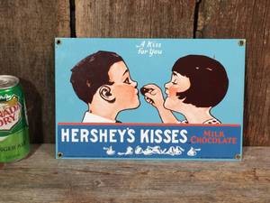 lot 22 image: Vintage Ande Rooney Porcelain Hersheys Kisses Metal Sign