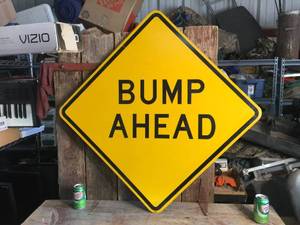 lot 92 image: Large Bump Ahead Metal Sign