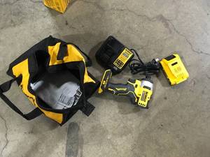 DEWALT ATOMIC 20V Max Lithium-Ion Brushless Cordless Compact 14 in. Impact Driver Kit with 2.0Ah Battery, Charger and Bag Customer Returns See Picture
