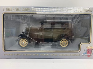 lot 61 image: Motor City Classics 1931 Ford Model A Tudor in Chickle Drab
