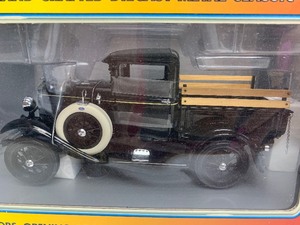lot 127 image: Motor City Classics 1931 FORD MODEL A Pick Up Black Stake Truck w Real Wood