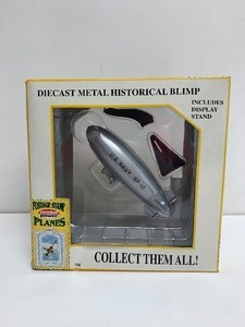 lot 154 image: Postage Stamp Planes Historical Accurate Navy Blimp Diecast Metal w Display Stand