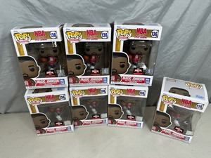 lot 29 image: 7 New Magic Johnson Funko Pop Collectibles