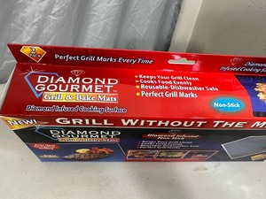lot 39 image: New 2 Pack Diamond Gourmet Grill and Bake Mats