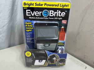 lot 201 image: New Ever Brite Solar Powered Motion Light