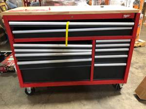 Milwaukee 52 in. W x 22 in. D 12 Drawer Heavy Duty Mobile Workbench Cabinet in Red Damaged Customer Returns See Pictures