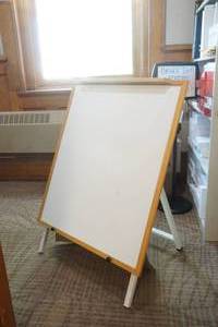 lot 32 image: white board with paper