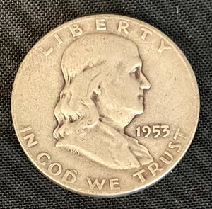 4 United States Benjamin Franklin Half Dollar Coins from 1950, 1953, 1957 and 1965